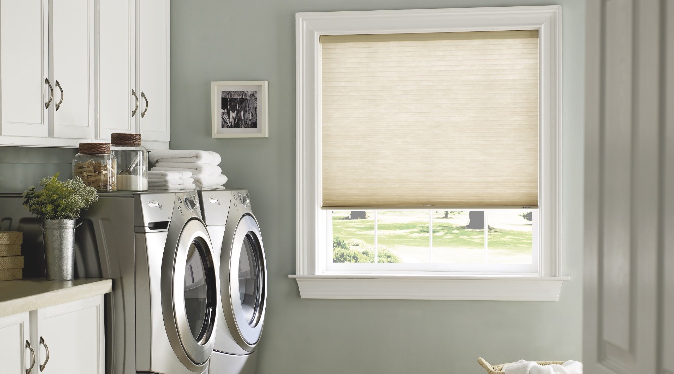 Laundry room with shades